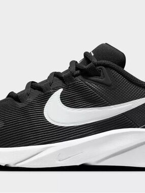 Nike Black Kids' Sneaker with White Label and Swoosh